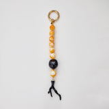 Yellow amber and black coral