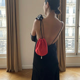 Red silk bag with pearl