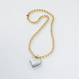 Silver heart golden chain