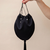 Black silk bag with silk tassel