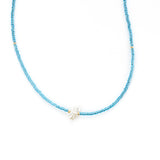 Blue beaded necklace with pearl