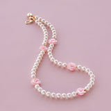 In Bloom 5 pink pearl roses