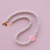 In Bloom pink shell rose grey pearls