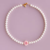 In Bloom pink shell rose white pearls