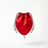 Red silk bag with pearl