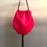 Red silk bag with beaded tassel