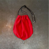 Red silk bag with pearl