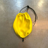 Yellow silk bag with onyx