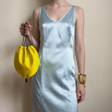 Yellow silk bag with onyx