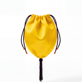 Yellow silk bag with beaded tassel